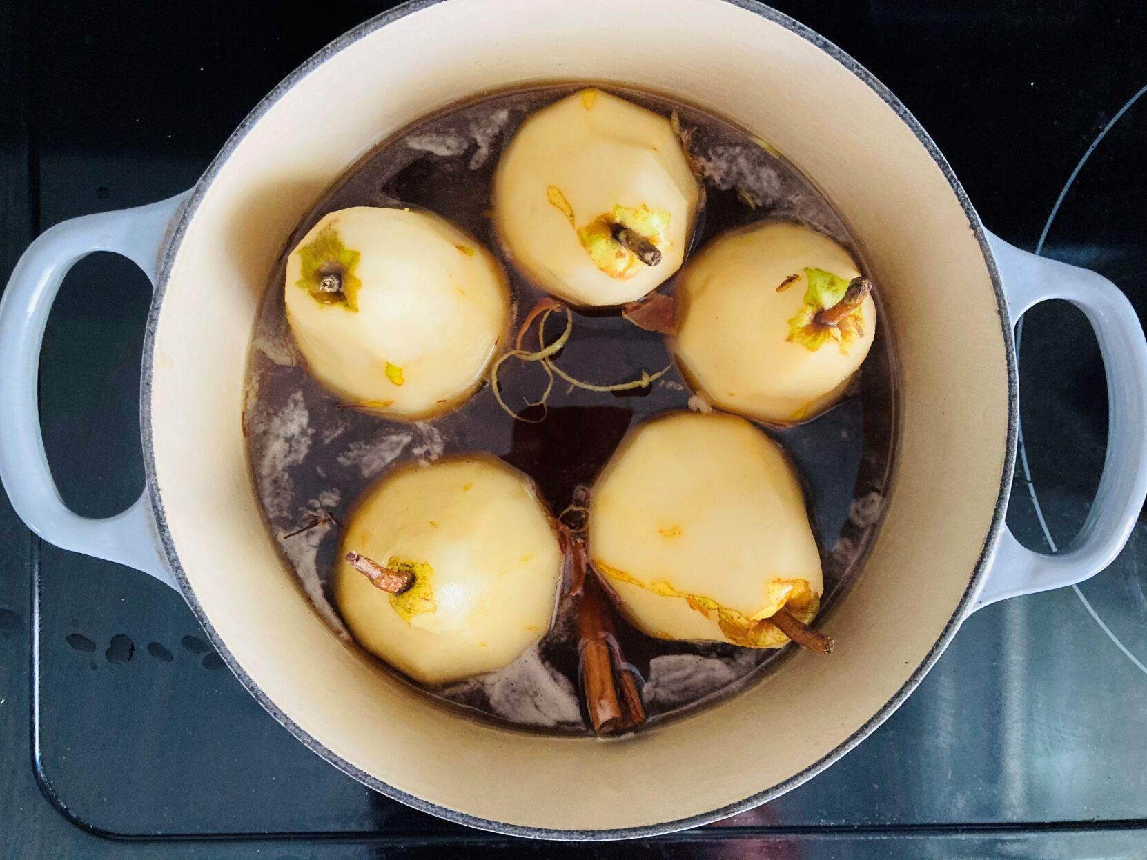 Poached pears in liquid